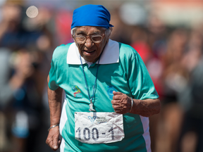 Man Kaur, 100, of India, competes in the 100m track and field event at the Americas Masters Games in Vancouver on Aug. 29.