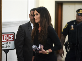 Ellen Granahan Goffer, twin sister of Pennsylvania Attorney General Kathleen Kane, walks into the courtroom on the opening day of Kane's trial at the Montgomery County Courthouse Monday, Aug. 8, 2016.