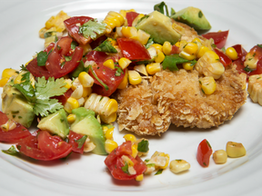 Bonnie Stern's Tortilla Crusted Chicken Schnitzel topped with Grilled Corn, Tomato and Avocado Salad.