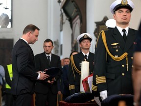 Polish president Andrzej Duda attending the funeral held for Danuta Siedzikowna and Feliks Selmanowicz, who were executed by Soviet agents in 1946.