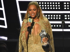 Beyonce accepts the award for best female video for “Hold Up” at the MTV Video Music Awards at Madison Square Garden on Sunday, Aug. 28, 2016, in New York.