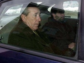 Vito Rizzuto is taken from a Montreal police station in 2004