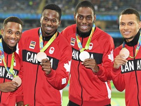Members of Canada's 4x100m men's relay team, from left, Akeem Haynes, Aaron Brown, Brendon Rodney and Andre De Grasse, show off their bronze medals at the Summer Olympics in Rio.