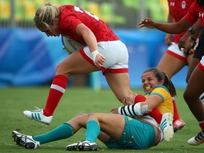 Kayla Moleschi of Team Canada gets past Chloe Dalton of Team Australia during the Women's Rugby Sevens Semi-Finals match during 2016 Rio Olympics in Rio de Janeiro, Brazil on Monday August 8, 2016.