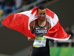 Andre de Grasse of Canada celebrates his silver medal in the men's 200m in Rio on Aug. 18.