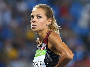 Melissa Bishop gazes at the scoreboard after finishing fourth in the women's 800-metre final in Rio on Aug. 20.