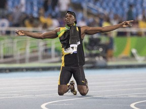 Usain Bolt prepares to kiss the finish line at Rio 2016 after winning what is expected to be the last of his nine Olympic sprint gold medals.
