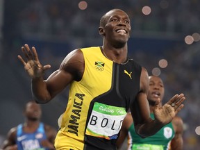 Usain Bolt smiles after winning 100-metre gold at Rio 2016.