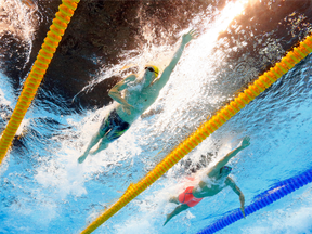 Mack Horton (left) and Sun Yang compete in the men's 400-metre freestyle final on Saturday.