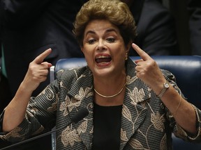 Suspended President Dilma Rousseff speaks while answering a question from a Senator on the Senate floor during her impeachment trial on August 29, 2016 in Brasilia, Brazil.