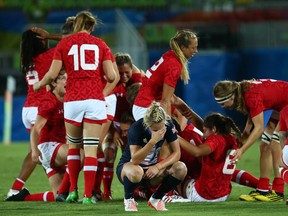 Team Canada celebrates winning the Rio 2016 women's rugby sevens bronze-medal match over Great Britain on Aug. 8.