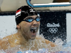 Singapore's Joseph Schooling celebrates after winning the gold medal in the men's 100m butterfly final in Rio last Friday.