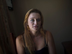 Shannon Graham poses in her home in Bridgewater, N.S. on Saturday, August 27, 2016. Graham says she regrets reporting her sexual assault to the police and says she wants to let people know how the criminal justice system works.