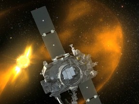 An artist's depiction of STEREO-B as it orbits the sun during a solar storm. The spacecraft, which has been silent for almost two years, recently sent a signal back to Earth.