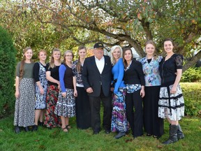 Winston Blackmore with family (eight daughters and granddaughter)  at the Creston Law Courts on Thursday, October 9, 2014.