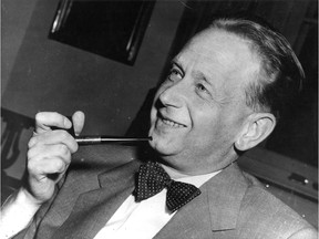 In this May 19, 1953, file photo, Dag Hammarskjold, recently appointed secretary general of the United Nations who is on a visit to Sweden, smokes his pipe at a press conference held at the Foreign Office in Stockholm.