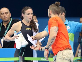 Medal-winning Hungarian swimmer Katinka Hosszu is coached by her husband, Shane Tusup.