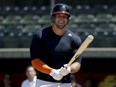Former NFL quarterback Tim Tebow smiles during a work out for baseball scout and the media during a showcase on the campus of the University of Southern California, Tuesday, Aug. 30, 2016 in Los Angeles.