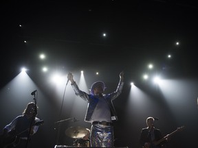 From left, Paul Langlois, Johnny Fay, Gord Downie, Gord Sinclair and Rob Baker of The Tragically Hip perform on Wednesday, Aug. 10, 2016, in Toronto, Canada.