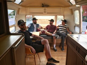 The Trans-Canada Fryway team in their 1974 Airstream trailer.