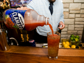 Bartender Rob Montgomery prepares a Caesar at the Miller Tavern in Toronto, Thursday afternoon, August 5, 2010.