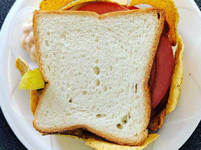 The Windsor Sandwich Shop's Trump Sandwich featured two slices of white bread filled with bologna, walls of tortilla chips, Russian dressing, and a little pickle.
