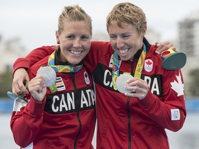 August 12, 2016 - Lindsay Jennerich (left) and Patricia Obee (right), of Canada, celebrate their silver medal win in women's lightweight double sculls in Rio 2016 Olympic Games in Rio de Janeiro, Brazil, , Friday, August 12, 2016.