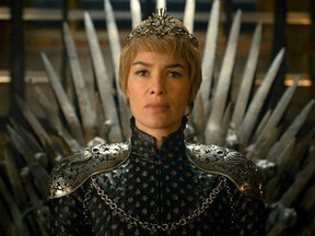 In this undated image released by HBO, Lena Headey appears in a scene from "Game of Thrones." Composer Ramin Djawadi is leading a 28-city tour across North America, using a full orchestra and choir to illustrate some favourite scenes from the show that will be broadcast on LED screens for fans.