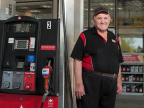 Dick Assman poses by a gas pump at a South Albert St. Petro-Canada gas station in Regina, Saskatchewan on Tuesday, May 19, 2015.