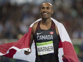 Damian Warner, of Canadian, celebrates his bronze medal in the men's decathlon at the Rio 2016 Olympic Games.