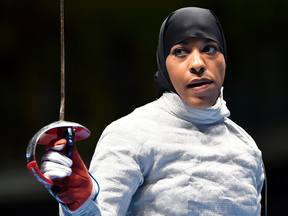 Ibtihaj Muhammad before a match against France's Cecilia Berder.