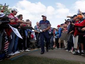 Phil Mickelson of the United States is greeted by fans during practice prior to the 2016 Ryder Cup at Hazeltine National Golf Club on Sept. 29, 2016 in Chaska, Minn.