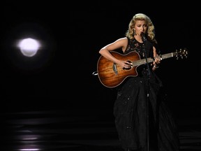 Tori Kelly performs "Hallelujah" during an In Memoriam tribute at the 68th Primetime Emmy Awards on Sunday, Sept. 18, 2016, at the Microsoft Theater in Los Angeles.