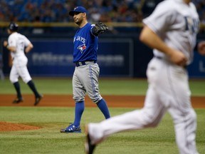 Marco Estrada reacts after walking Tampa Bay's Brad Miller with the bases loaded in the sixth inning of Tampa's 7-5 win on Sept. 3.