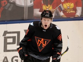 North America's Morgan Rielly celebrates his second-period goal against Russia on Sept. 19.