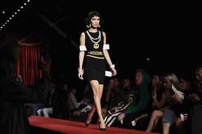 Milan Fashion Week watch: Gigi Hadid fends off man-handler between runway  turns