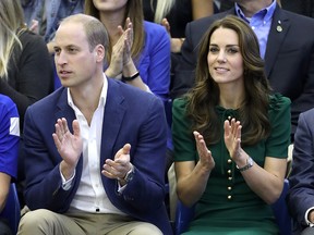 Prince William, Duke of Cambridge and Catherine Duchess of Cambridge take in a Kelowna volleyball match.