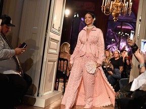 Rihanna walks the runway during her Fenty Puma Spring 2017 collection show as part of Paris Fashion Week on September 28, 2016.