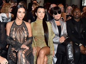 Kim Kardashian, Kourtney Kardashian, Kris Jenner and Corey Gamble attend the Balmain Spring 2017 collection show as part of Paris Fashion Week on September 29, 2016 in Paris, France.