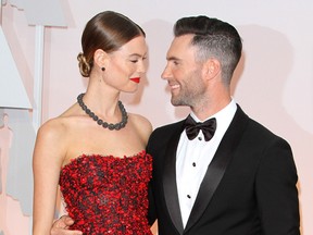 Model Behati Prinsloo, Adam Levine.