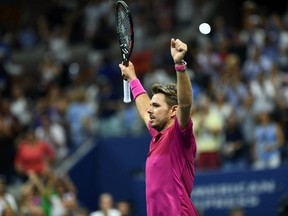 Stan Wawrinka celebrates after defeating Novak Djokovic in the U.S. Open men's singles final on Sept. 11.