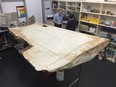An undated handout photo released by the Australian Transport Safety Board (ATSB) and received on September 15, 2016, shows a large piece of debris found in Tanzania recently which has been confirmed as a part of a wing flap from missing Malaysia Airlines passenger jet MH370.

The outboard flap is the fifth piece of the plane to be identified by experts in Canberra since the first bit of debris  from MH370 -- a two-metre (almost seven-foot) wing part known as a flaperon -- was found on the French Indian Ocean island of Reunion in July 2015.