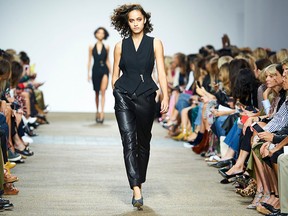 A model walks the runway during the Topshop Unique Spring 2017 collection show as part of London Fashion Week on September 18, 2016.