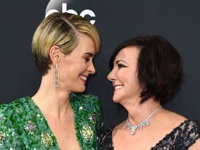 Sarah Paulson, left, and Marcia Clark arrive at the 68th Primetime Emmy Awards on Sunday, Sept. 18, 2016, at the Microsoft Theater in Los Angeles.