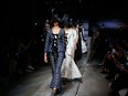 Models walk the runway during the Erdem Spring 2017 collection show as part of London Fashion Week on September 19, 2016.