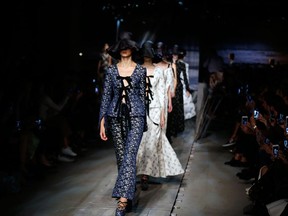 Models walk the runway during the Erdem Spring 2017 collection show as part of London Fashion Week on September 19, 2016.