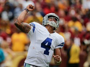 Dallas Cowboys quarterback Dak Prescott celebrates Alfred Morris' game-winning touchdown against the Washington Redskins on Sept. 18.