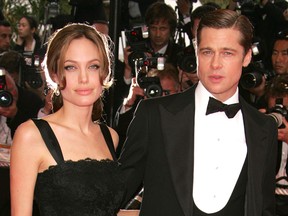 Brad Pitt and Angelina Jolie attend the premiere for the film "A Mighty Heart" at the Palais des Festivals during the 60th International Cannes Film Festival on May 21, 2007 in Cannes, France.