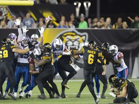 Brett Maher of the Hamilton Tiger-Cats kicks the game-winning field with no time remaining giving the Ticats a 20-17 victory over the Montreal Alouettes in CFL action Friday in Hamilton. Maher had four field goals in keying the victory.