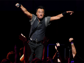 Bruce Springsteen interacts with the crowd during his concert with the E Street Band at the Los Angeles Sports Arena on Tuesday, March 15, 2016, in Los Angeles.